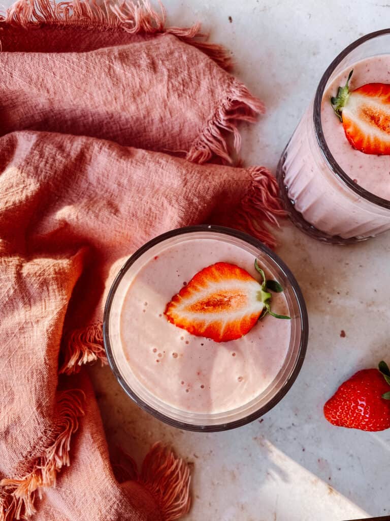 top view of pink strawberry oat breakfast smoothie